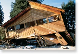 Photo of soft story house, collapsed from the 1989 Loma Prieta earthquake.